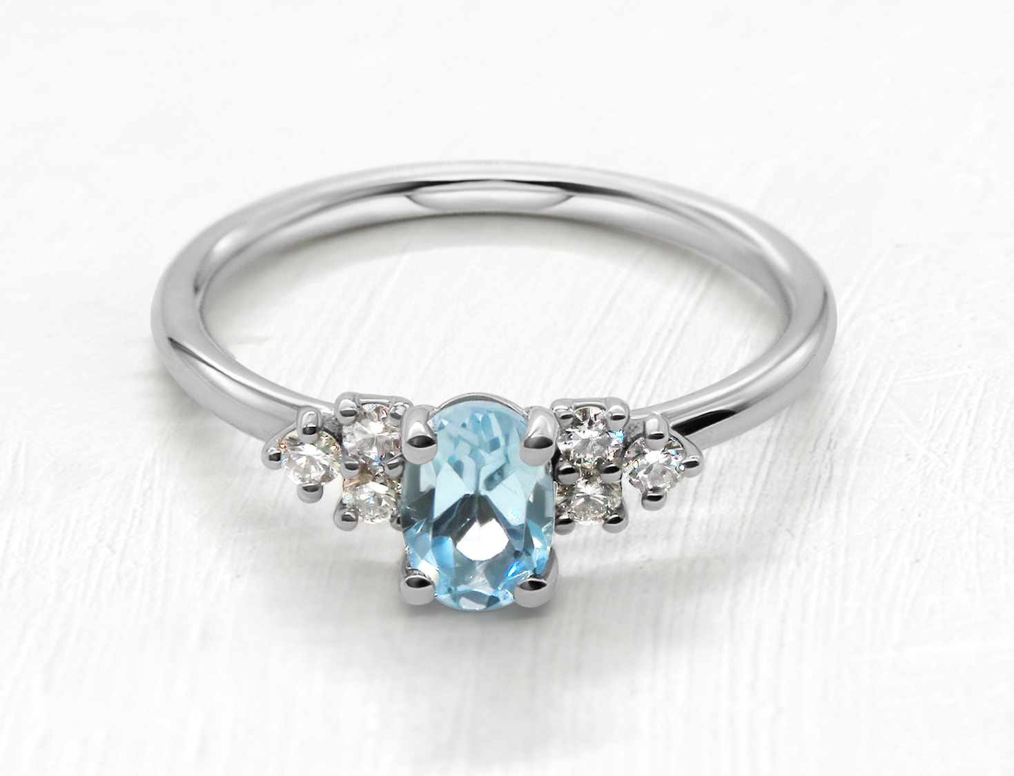 Blue Topaz and Diamond White Gold Ring
