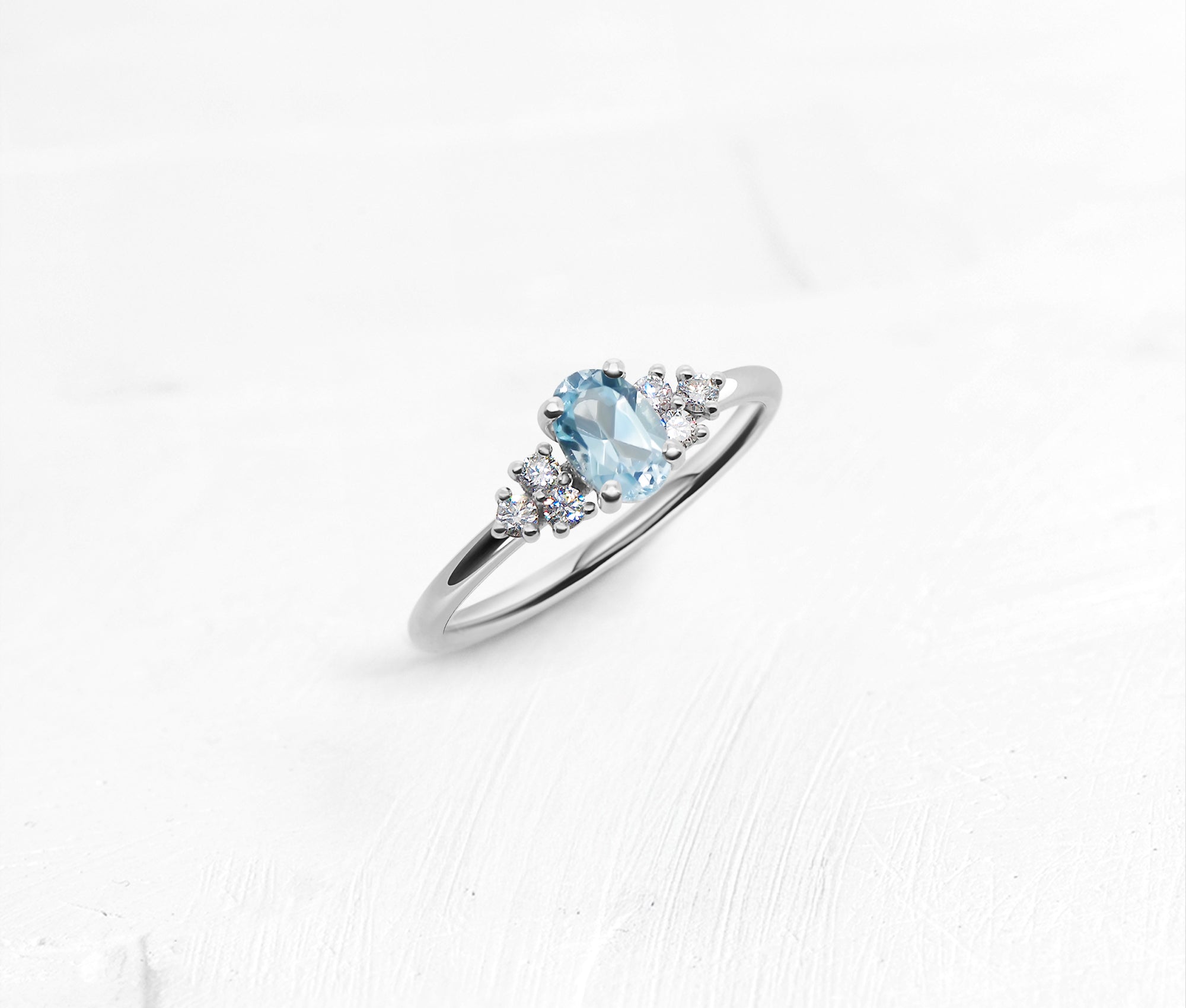 Blue Topaz and Diamond White Gold Ring