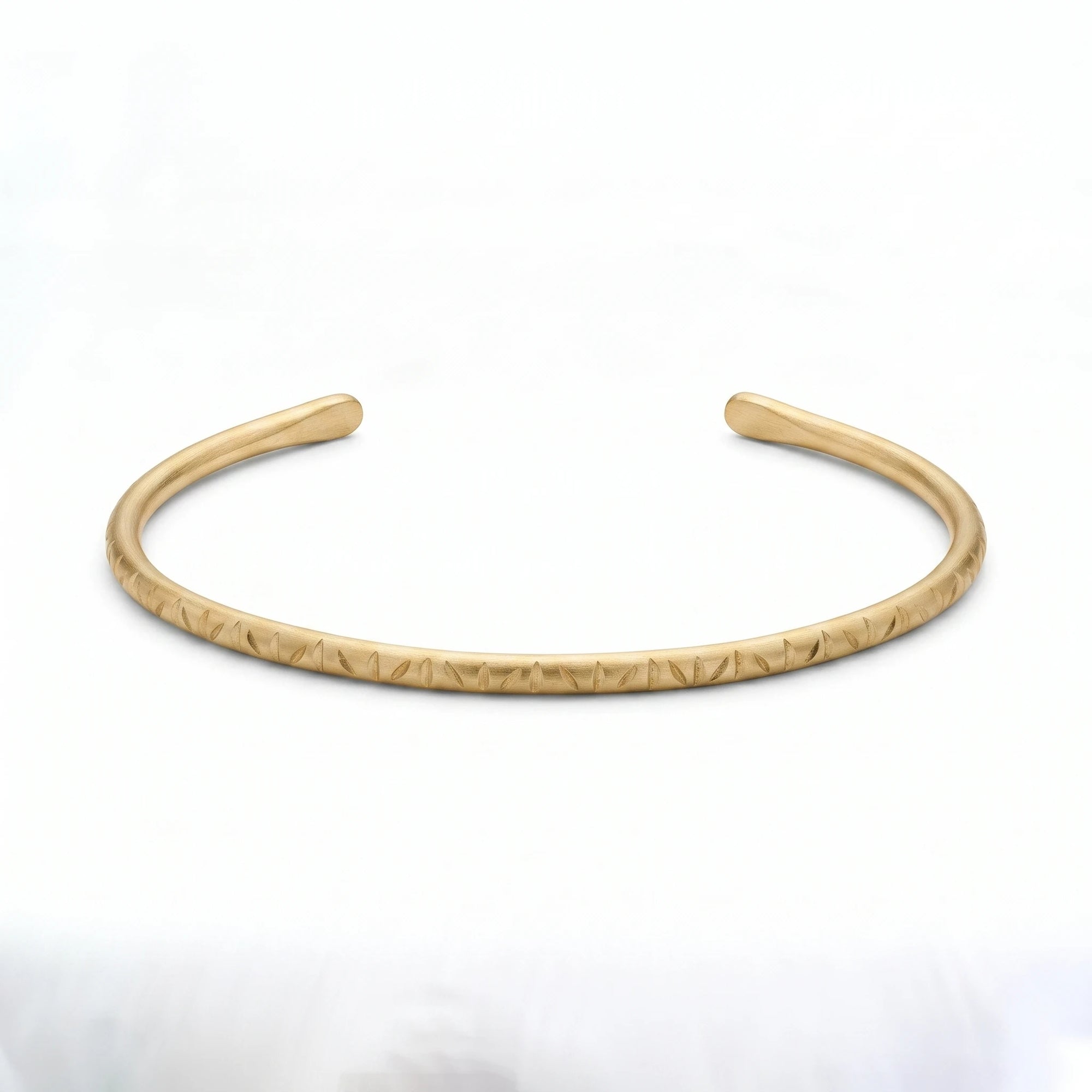 Gold Cuff Bracelet with Decorative Finish
