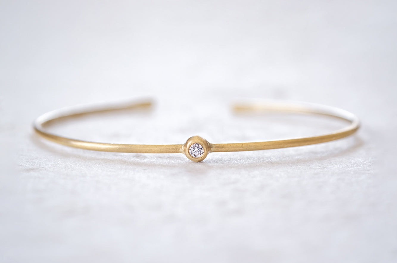 Gold Bracelet Set With A Natural Diamond
