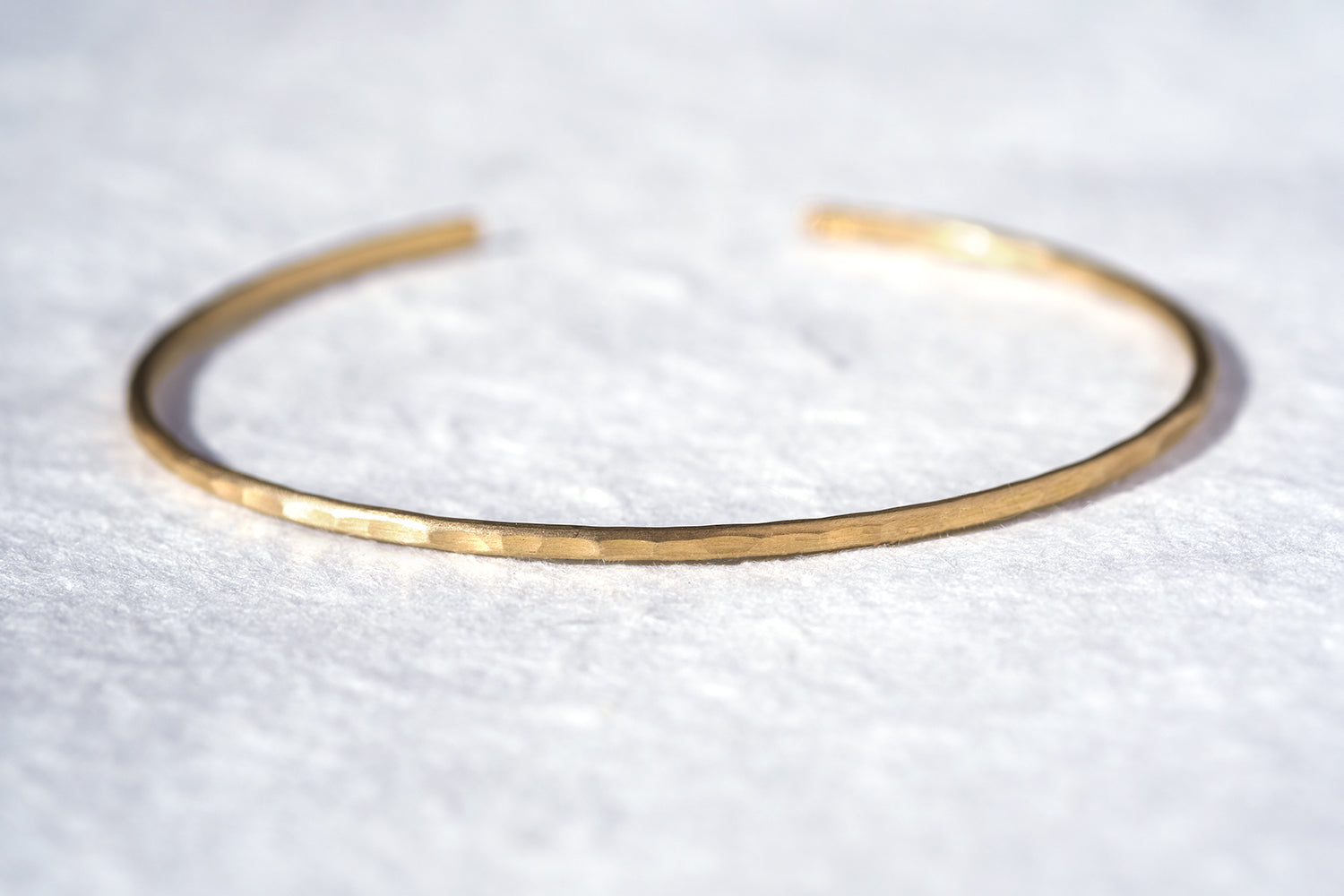 Delicate Gold Bracelet With A Hammered Finish